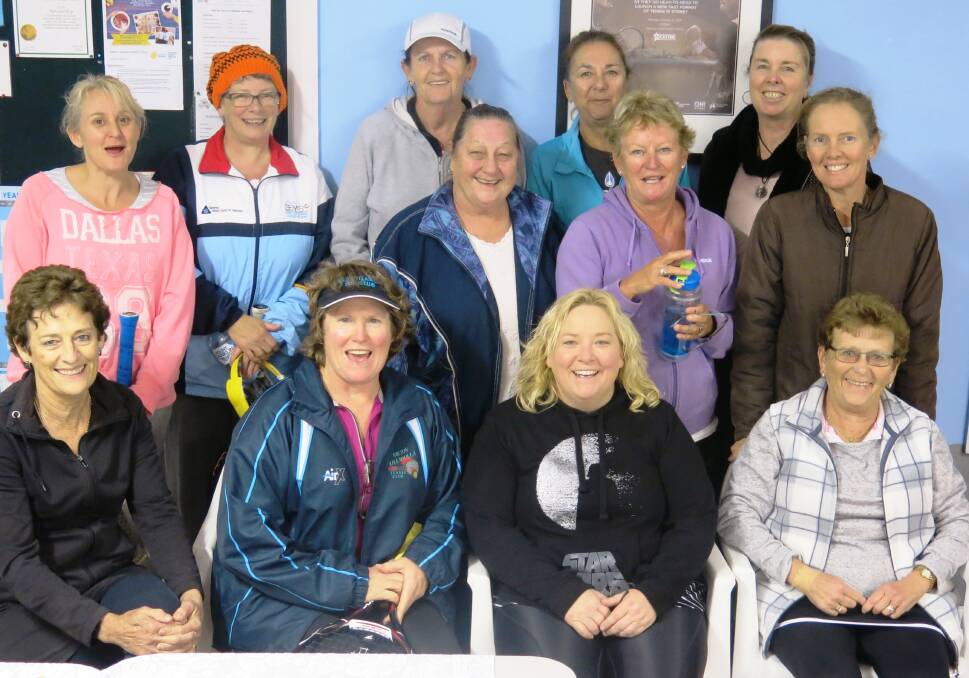 Winners and losers: Thursday Night Ladies competition finalists and wooden spooners get together after the finals last week. The new winter competition starts on July 20.