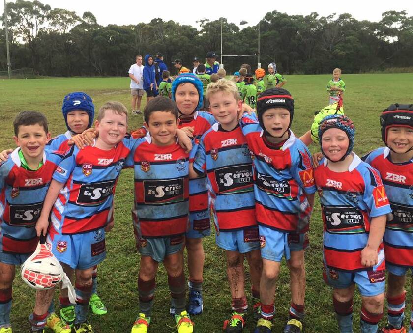 Great fun: The Junior Bulldogs U8 Reds were muddy but happy after their round 7 match against Culburra. Photo: Fiona Butson
