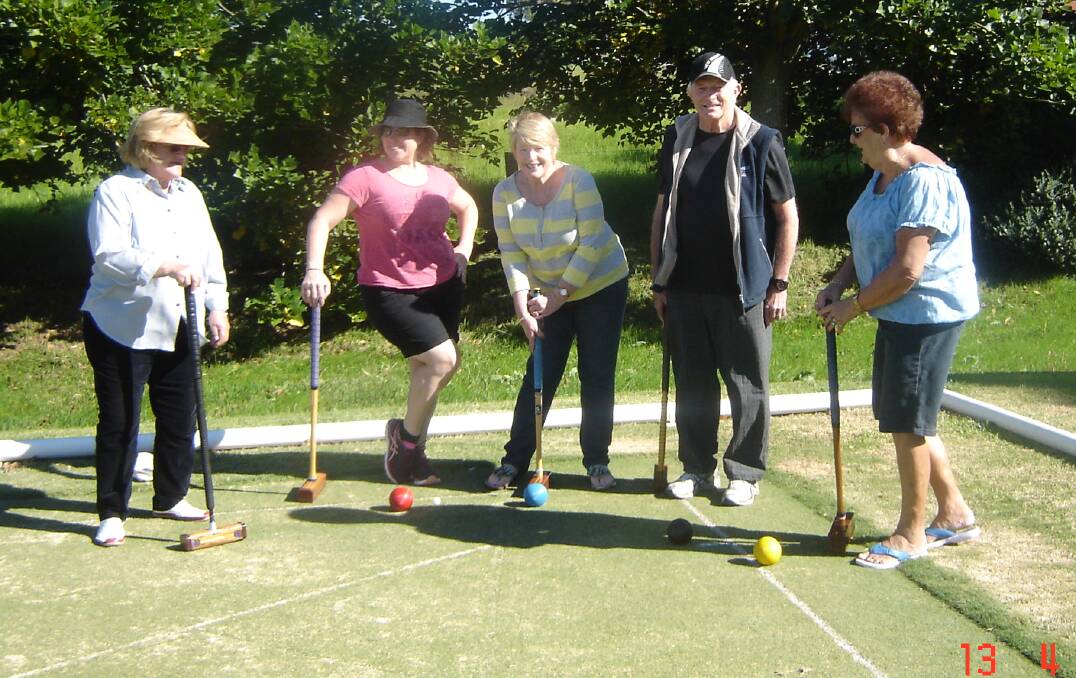 Fourteen members of the Caravan Club of Australia tried their hands at golf croquet at the Milton Ulladulla Croquet Club during Easter week.