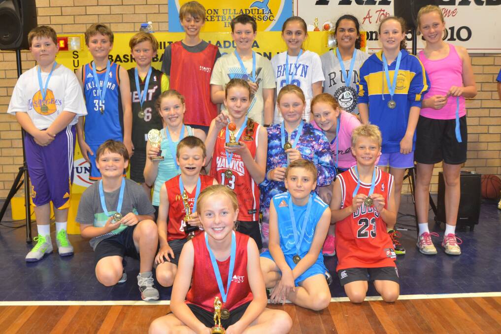 ATHLETES TO KEEP AN EYE ON: The under 10s Milton Ulladulla Dolphins players celebrate their success at the annual “Junior All-Star” day.