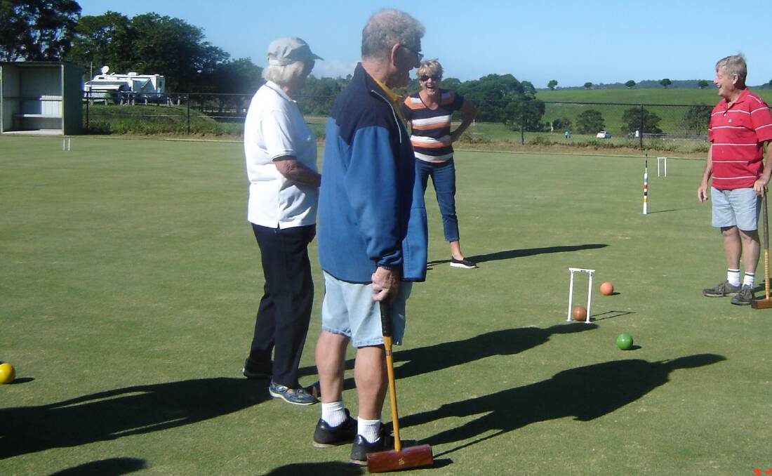 The Sydney visitors were all ears as they learnt the finer points of croquet.