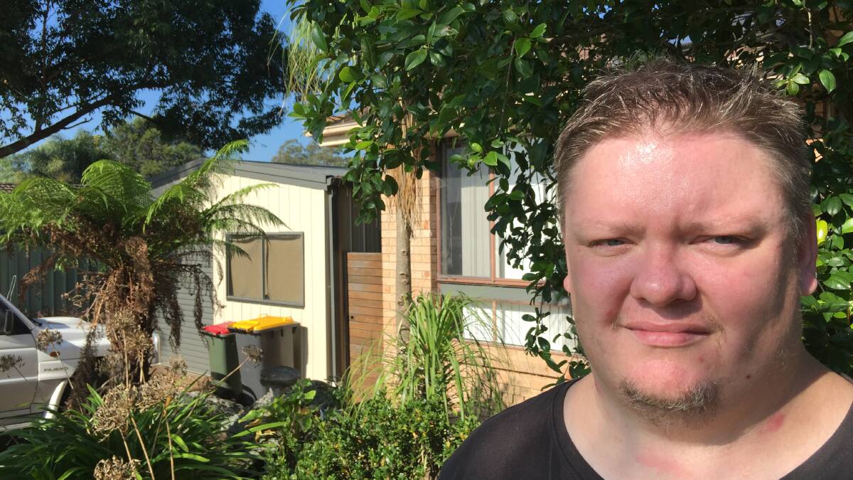 BATTLER: Aaron Gray outside his home in Bomaderry, a place he rarely leaves thanks to his post traumatic stress.