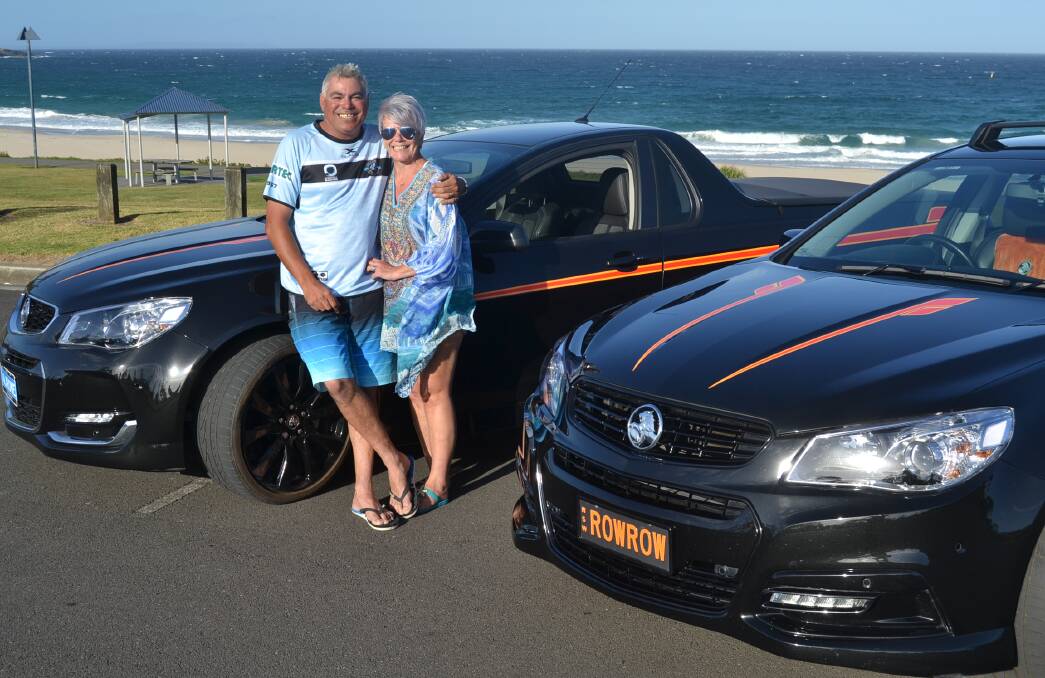 SAD DAY: AJ and Terri Rowe with their matching Holden Sandman cars. They will are disapointed the company will stop producing cars in Australia. 
