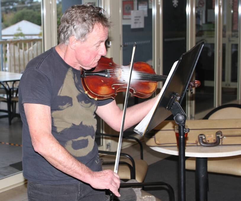 PASSIONATE: Class act Ray Ackerman's relatively anonymous sessions may shortly pick up some new fans of spiced up traditional and bluegrass fiddle. Photo: Ken Banks.