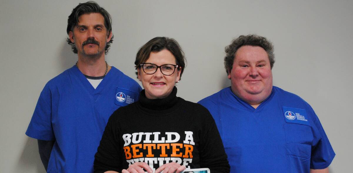 SUPPORT: ACTU President Ged Kearney (centre) meets with L-R NSW NMA Organiser Mark Murphy and NMA area Deligate Michael Summers.