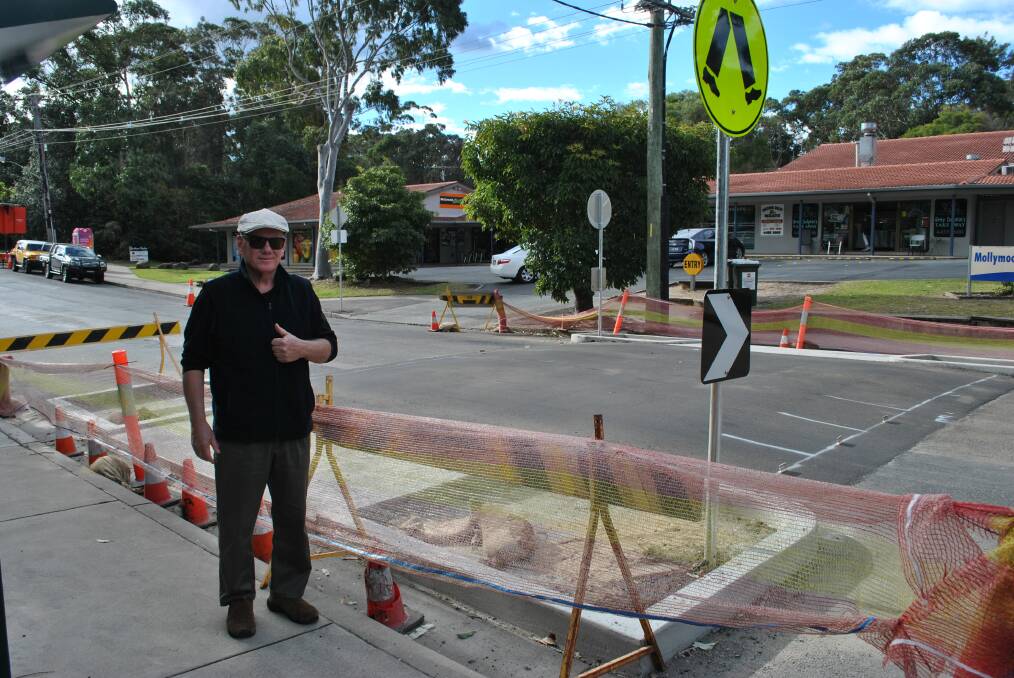 WOOHOO: Peter Earley is impressed with the new pedestrian crossing. He said many children, families and elderly are benefiting from it already. 