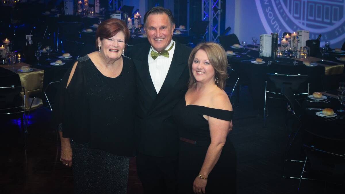 Lynn Smith manager MBA, MC Frankie J Holden and MBA office assistant Teresa Townsend.