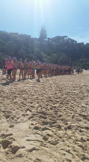 GAME ON: Swimmers heading out into the ocean. Image: supplied.