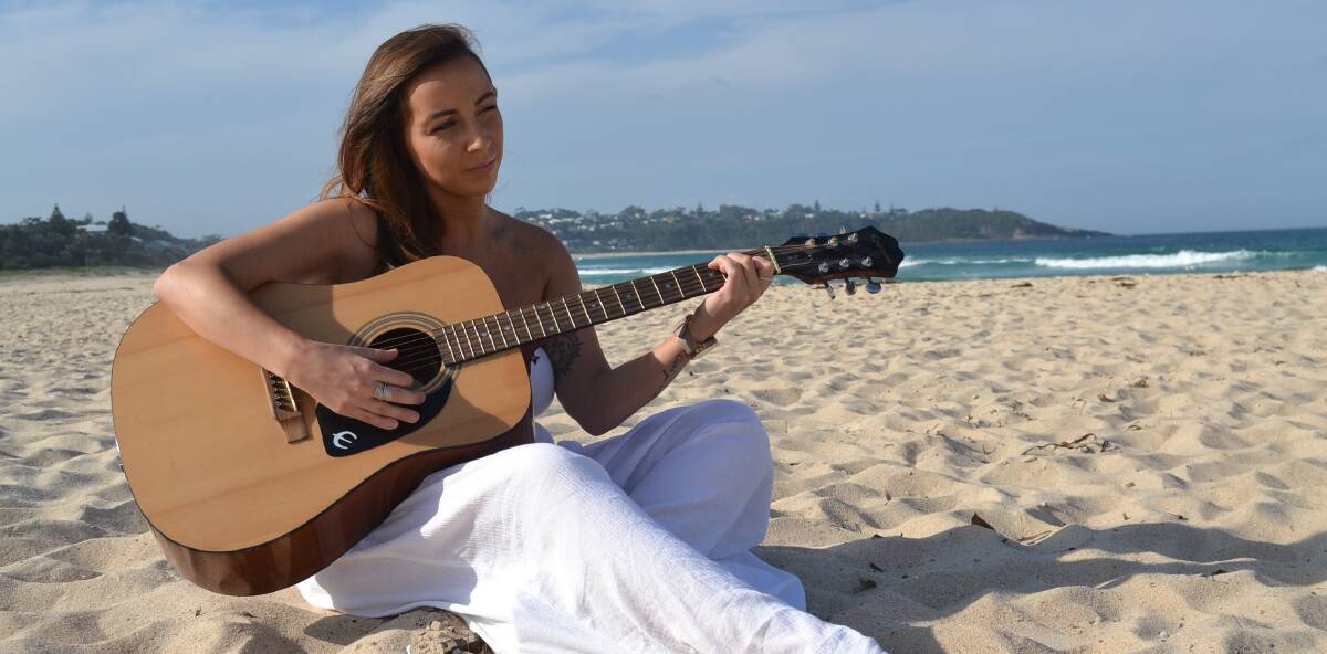 REFLECTION: Jessica Graham visits the beach and plays guitar when she wants to feel close to her sister Jessica Tolhurst who took her own life.