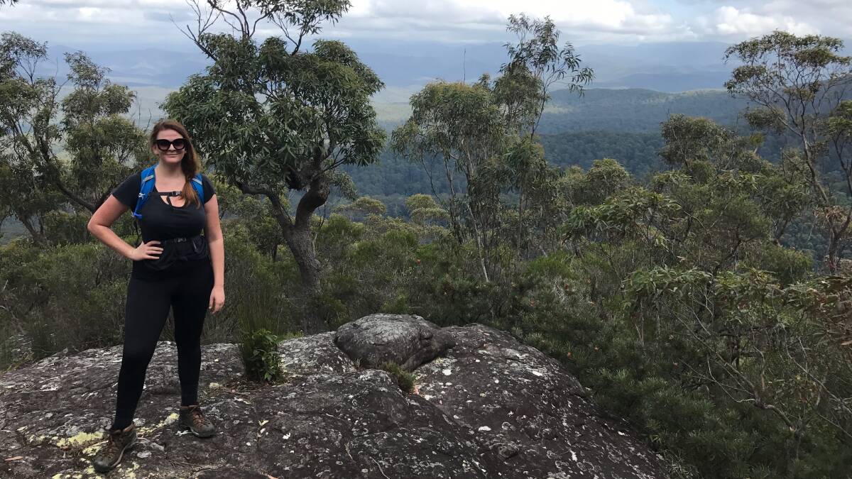 Grace McBride at Pigeon House Mountain during a training trek. Image: supplied.
