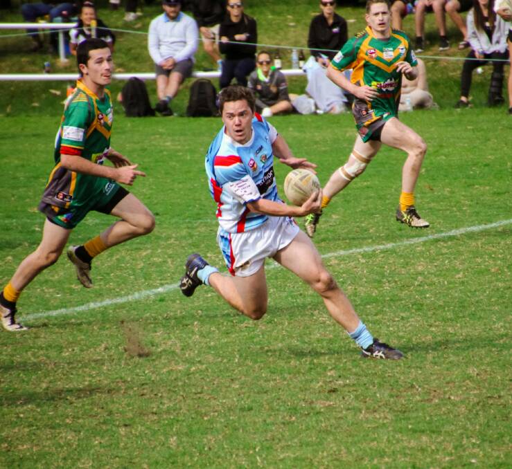 LAST GAME: Adam Diver looks for the pass during his final game of rugby league last week.