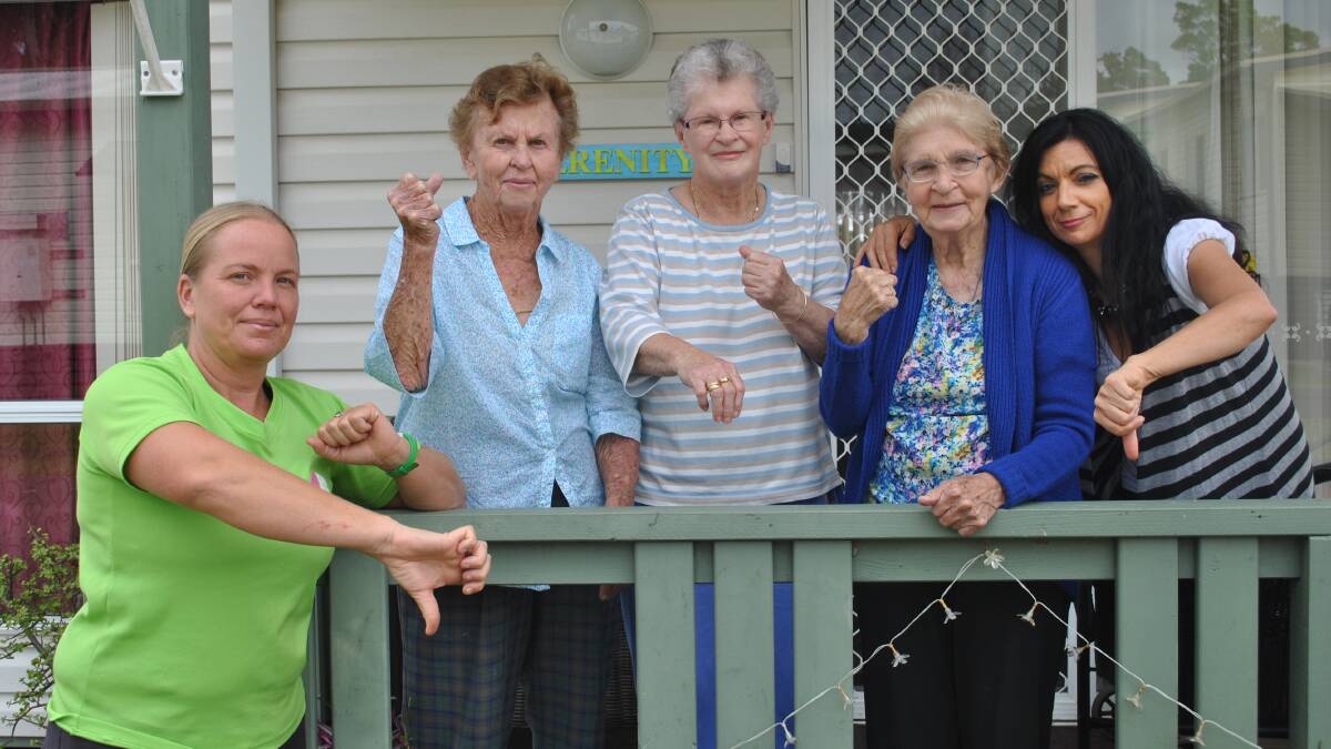 THUMBS DOWN: Exercise physiologist Brodie Cambourne, June Willis, Elizabeth Cannan, Rita Brayne and Nina Cheyne, Shoalhaven’s neurological nurse educator are disappointed after a recent announcement that funding for Ms Cheyne's position will not be available after June 30. Photo: Jessica McInerney.

