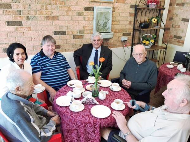 Aged Care Minister Ken Wyatt meets residents at a facility.

