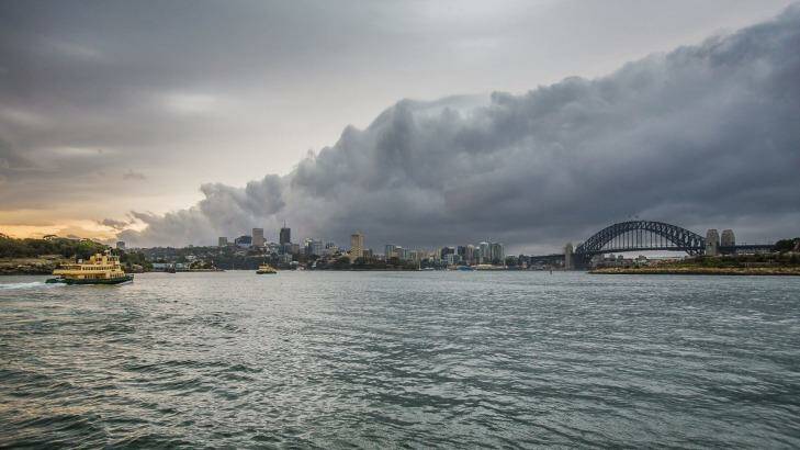 The storm rolls in over Sydney Harbour. Photo: Cole Bennetts