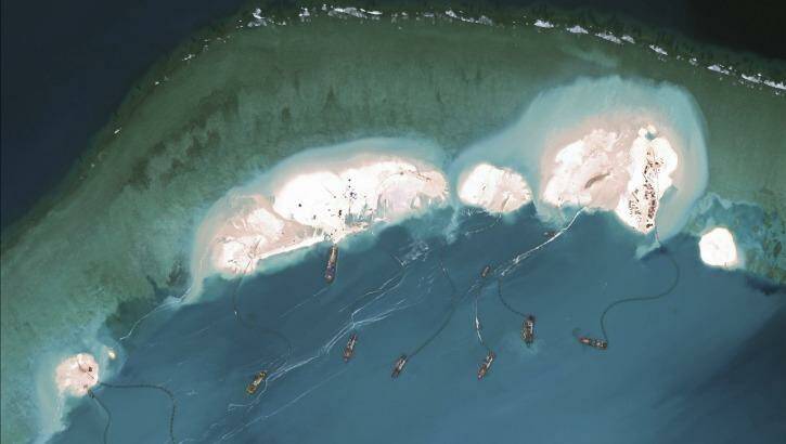 Chinese dredgers working at the northern-most reclamation site of Mischief Reef, part of the Spratly Islands, in the South China Sea, on March 17. Photo: CSIS Asia Maritime Transparency Initiative