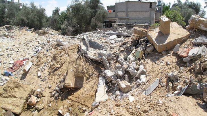 The remains of the Abu Jame family's three-storey apartment block destroyed in an airstrike, in which 26 people died. Photo: Ruth Pollard