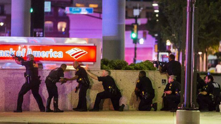 Dallas Police respond after shots were fired at a Black Lives Matter rally in downtown Dallas.  Photo: Smiley N. Pool/The Dallas Morning News