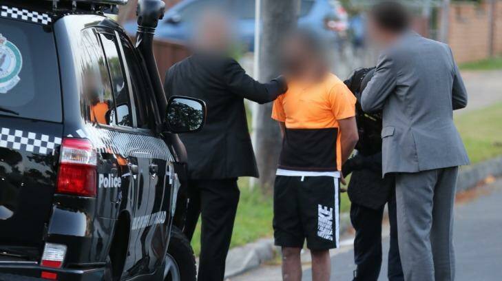 A man is arrested in Lockwood Street, Merrylands. Photo: NSW Police Media