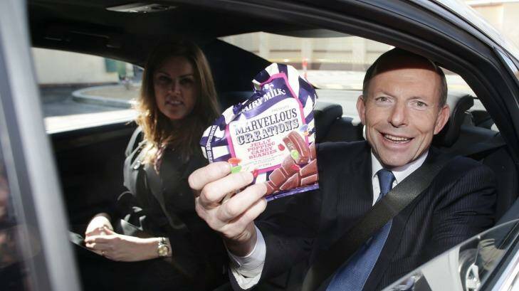 Then opposition leader Tony Abbott during a visit to the Cadbury factory during the 2013 election campaign. Photo: Alex Ellinghausen