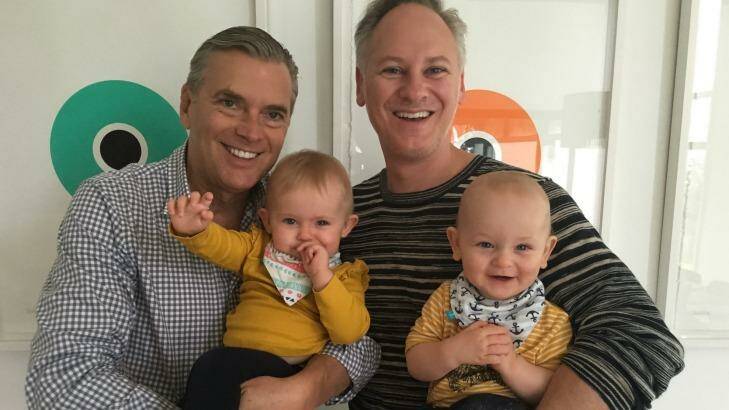 Dr Shane Woods and his partner Scott Koopman with their twins, born via surrogate. Photo: SUPPLIED Photo: SUPPLIED