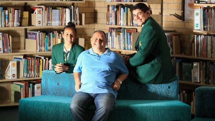 David Ghattas with his daughter, Stephanie and son, Sarkis at Merrylands High School, in Sydney's west.  Photo: Peter Rae