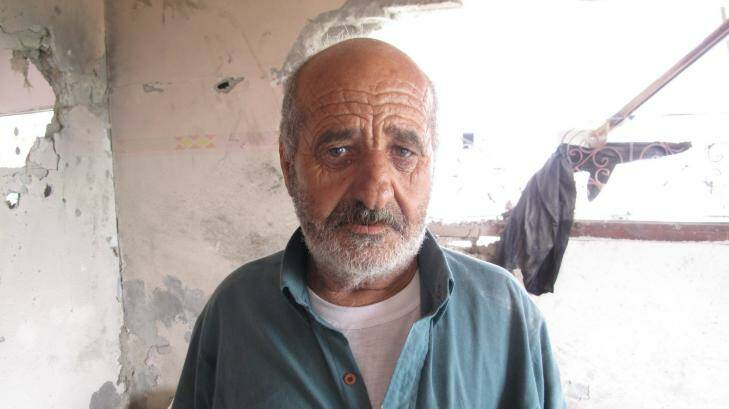 Alian Abu Jarad, 62, who lives next door, tried to rescue his family following the airstrike. Photo: Ruth Pollard