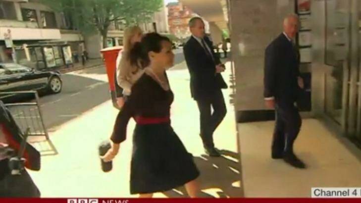 Prince Charles' top press adviser, Kristina Kyriacou, walks away with the protective covering of reporter Michael Crick's microphone. Photo: Screengrab from Channel 4 