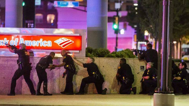 Dallas Police respond after shots were fired at a Black Lives Matter rally in downtown Dallas.  Photo: Smiley N. Pool/The Dallas Morning News