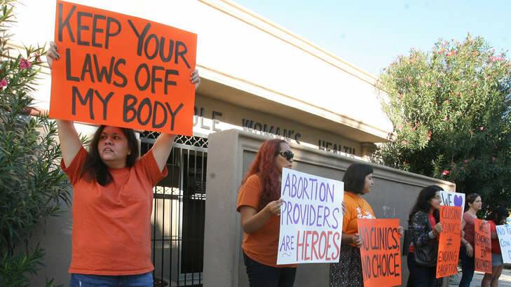 Outrage: Protesters outside the Whole Women's Health clinic in McAllen Texas. Photo: Joel Martinez
