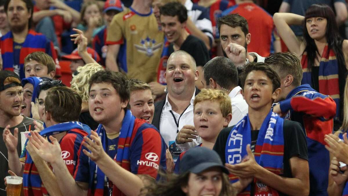 Nathan Tinkler with Jets supporters in the squadron's corner on April 17. Picture: Max Mason-Hubers