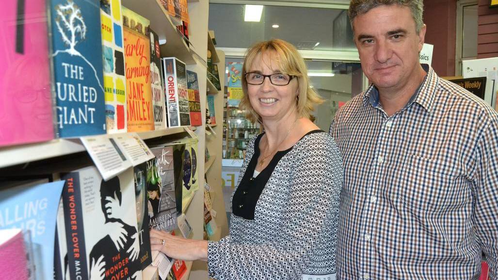 CHANGING TIMES: Michelle and Garry Evans at Ulladulla’s Harbour Bookstore which will not be affected by the ABC Shop closures announced on Thursday.