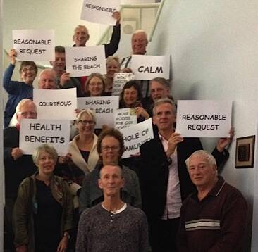 CAMPAIGN: Stephen Doolan (front) and a group of supporters presented a petition to last Tuesday night’s Shoalhaven City Council calling for changes to dog zones on Narrawallee Beach giving dog owners and their pets more freedom to exercise.