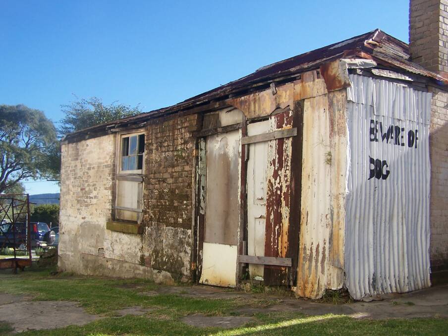 DISREPAIR: The rear of the building when the Starkeys purchased it in 1996.
