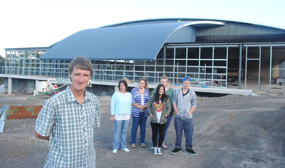 ALMOST THERE: The Dunn Lewis Centre’s new ground floor classrooms and auditorium shell are almost complete, with distance education teachers David Macguire (front) and Tina Babington, together with students Tash Joyce, Chantelle Mulligan, Angela Harris and Matt Pollard, keen to move out of their demountable and into the new rooms.