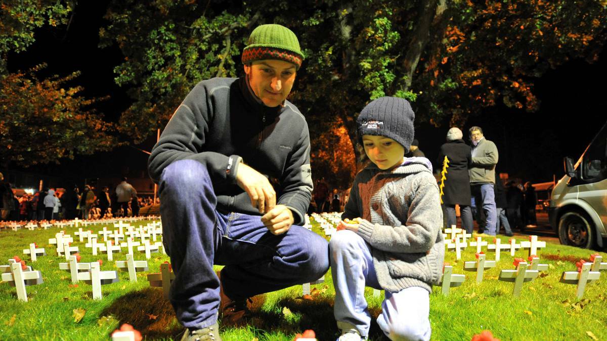 BALLARAT: Paul and Oliver Keast at the Dawn Service. Photo: Jeremy Bannister, The Courier. 