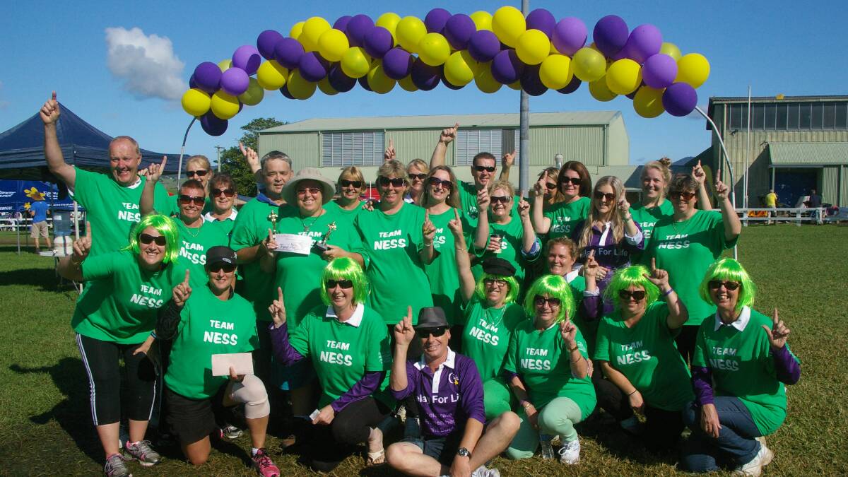 GOING GREEN: Vernessa Richards (centre) with Team Ness A and B members at the conclusion of last year’s Relay for Life. Vernessa lost her battle with cancer in July and will be remembered during this year’s event. 