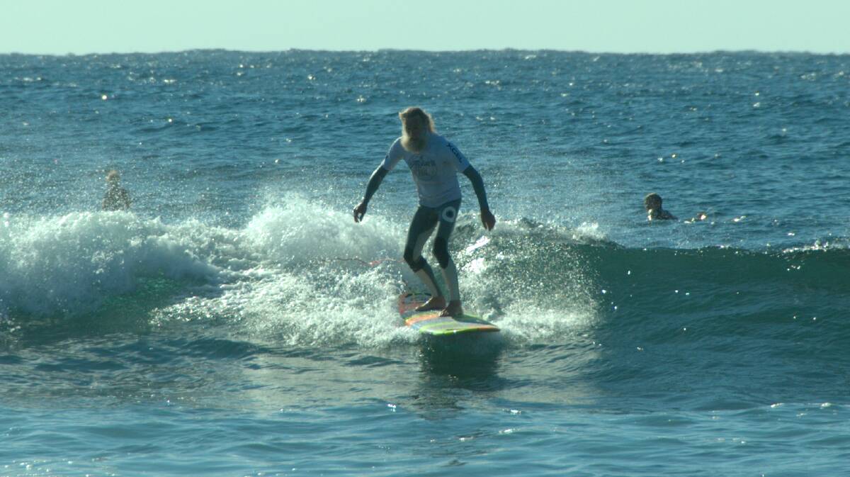 PRESIDENTIAL: Mollymook Longboarders Club president Carrey Klien makes good use of the conditions.