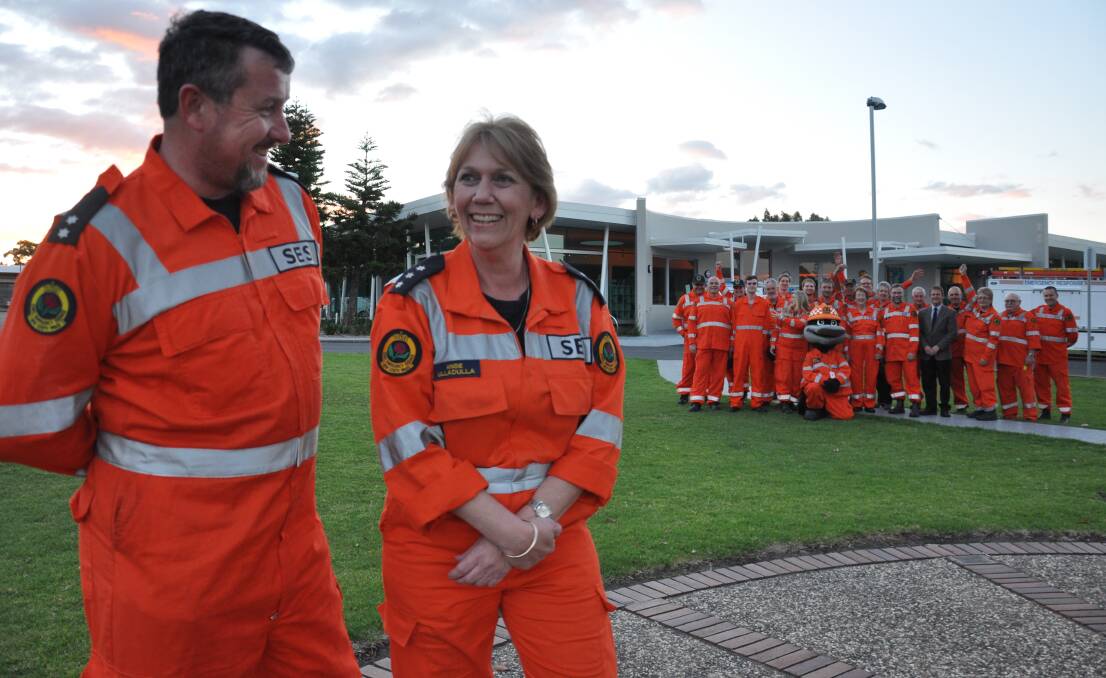 STORM SAFE: Ulladulla SES deputy unit controller James Gunn and unit controller Angie Batey with their local SES team.  