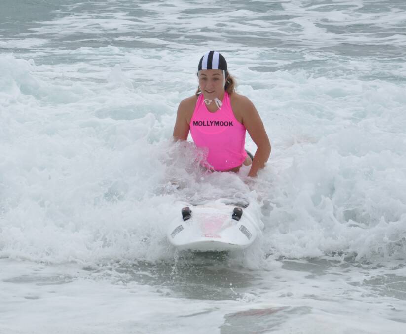 RIDE THE WAVE: Makenzi Ring practices her board skills ahead of the 2015 NSW Stramit Country Surf Life Saving Championships.