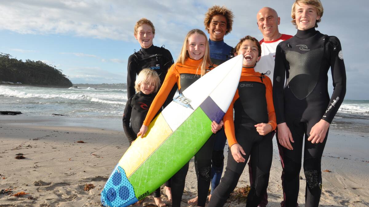 WAVE RIDERS: Local surfers (back)Aidan Lewand-Parsons, Charlie Brophy, Walking on Water and Ulladulla Surf Schools owner Simon Twitchen,  (front) Koby Jackson, Claire Brophy, Luke O’Connell and Zane Stedman. 