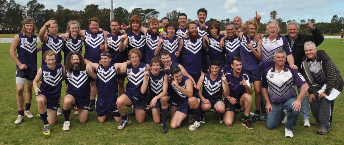 TEAM SUPREME: The Ulladulla Dockers and coaching staff are the 2014 reserve grade South Coast AFL premiers.   