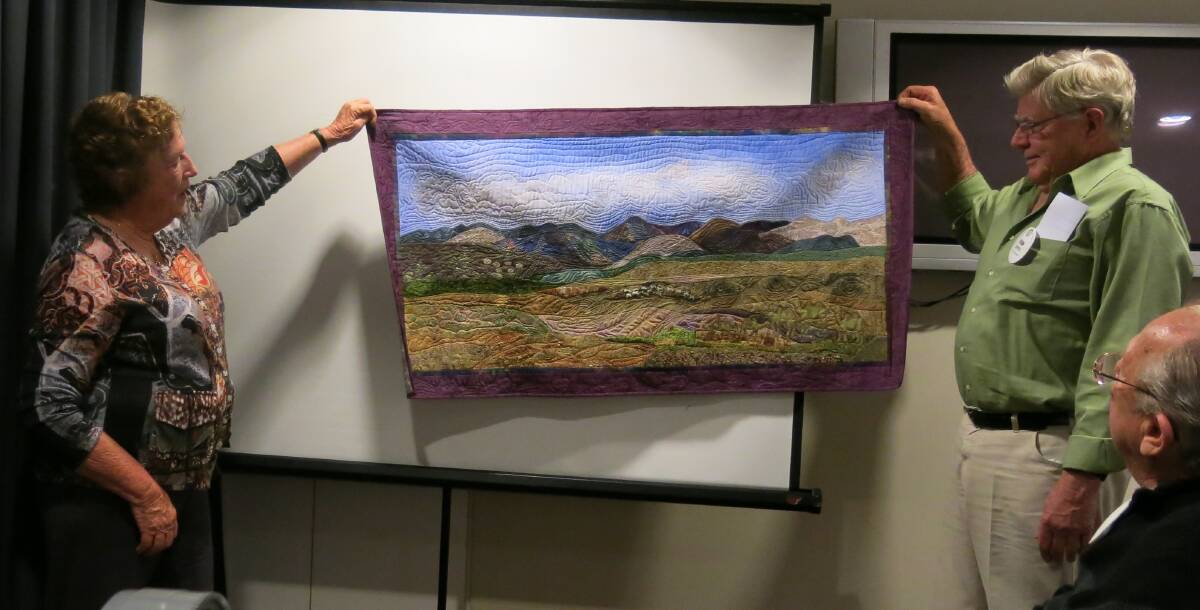 INSPIRED: Jenny and Robin Cantrill with the quilt made by Jenny of the Altai mountains in Mongolia.