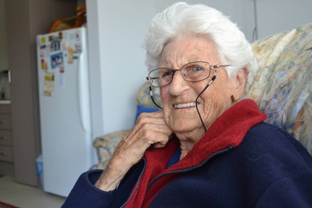 SMILING NOW: After three days of industrial fans being used in her home to dry to water damage, 90-year-old Merle Fraser was finally able to smile because her bedroom carpet was finally dry enough for her to access the room. 