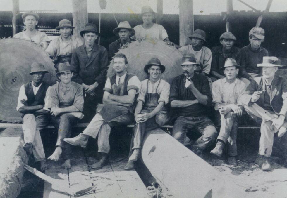 EARLY DAYS: Richard Johnson pictured with fellow workers at one of the local sawmills before he enlisted to fight in World War I. 