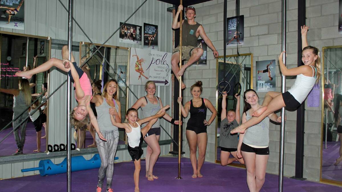 GET A GRIP: Pole Monkeys and the supporters Brodie McCluskey (left), instructor Alicia Millard, Sammy Cooney, Makenzie Zammit, Blake Prior, Emma Warn, Grace Hartmann, Kirsty Head and Phoebe Zammit show off some of their athletic moves.