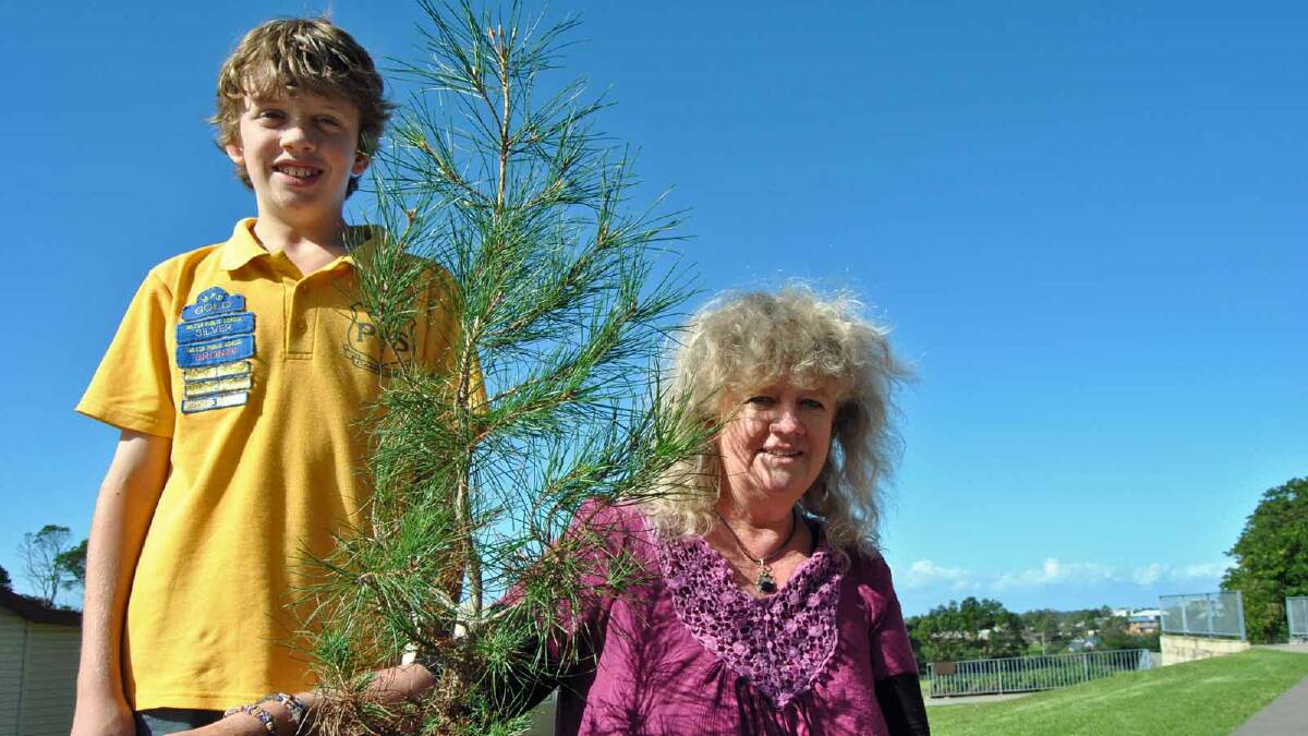 ANZAC GIFT: Student Angus Rutherford and his mum, teacher Louise Allen, presented a fourth generation Lone Pine seedling to Milton Public School. 