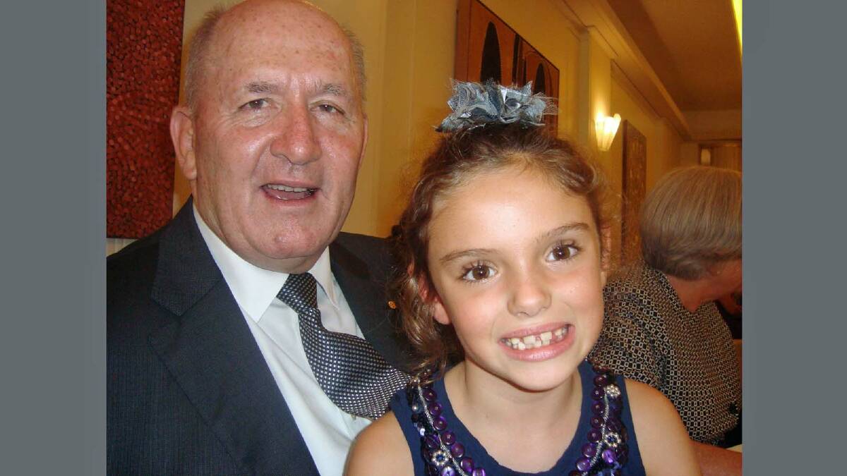 ROYAL ROLE: Bailey Bergin takes pride of place on the lap of her great uncle, Governor-General Sir Peter Cosgrove after he was sworn in as the Queen’s representative in Australia.