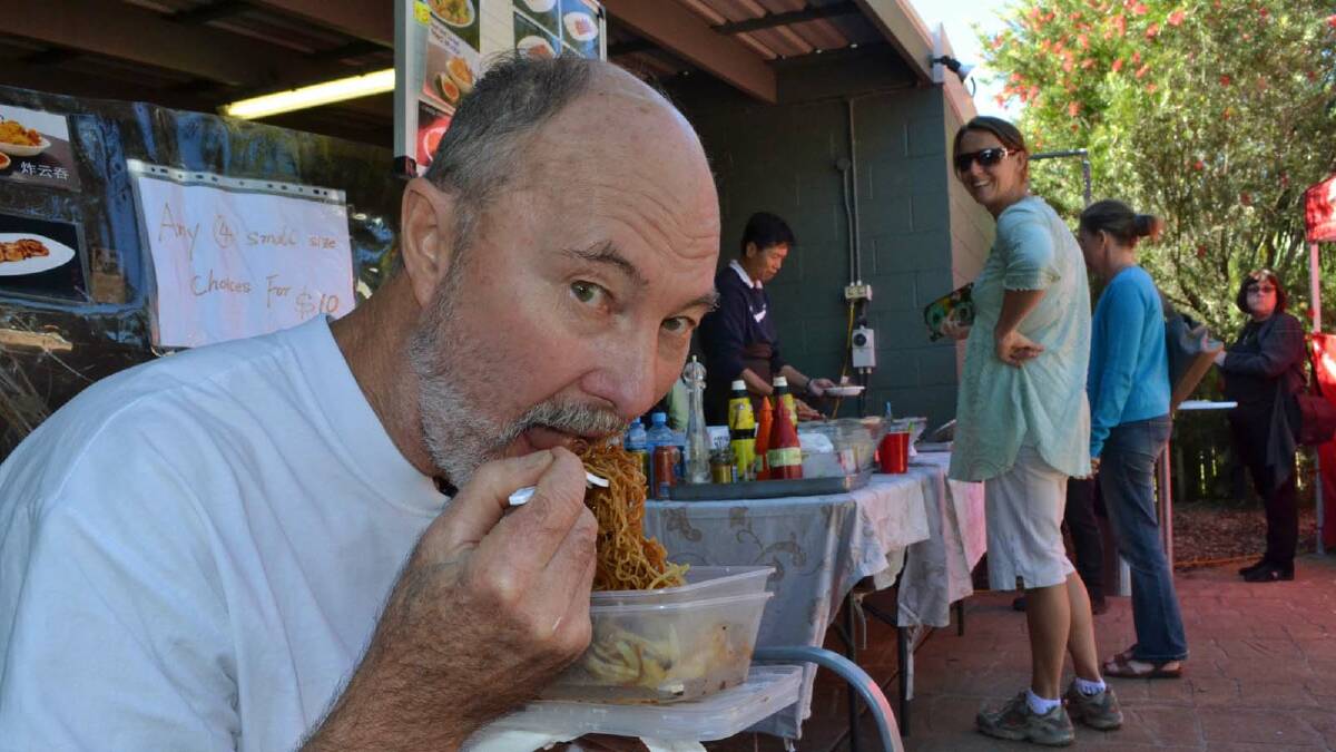 BIG DAY: John Olsen of Kings Point enjoys a Chinese noodle dish.