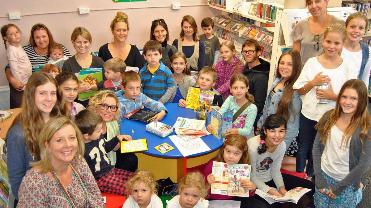 BOOK BATTLE: Alison Pakes (front left) has formed the Friends of Milton Library group and is leading the fight to keep the facility open for young families and elderly members of the community.