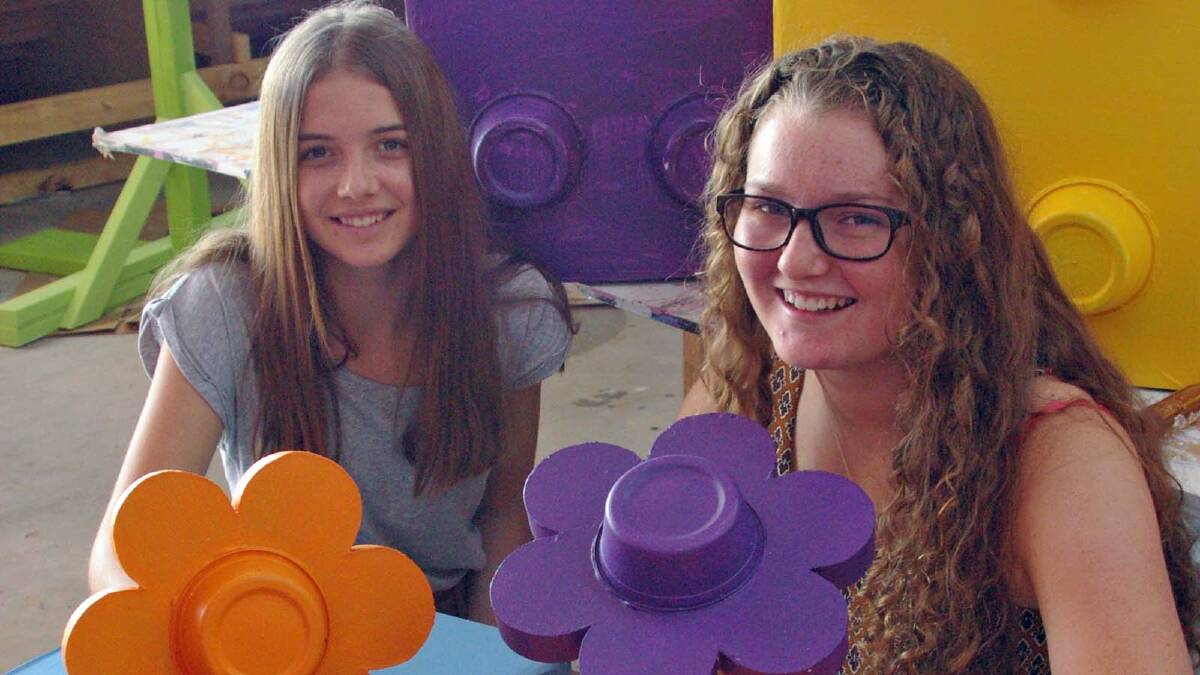 TOP SECRET: Amy Flamminio and Abbie Wilesmith are ready to assemble their Lego float for the Blessing of the Fleet parade on Easter Sunday.